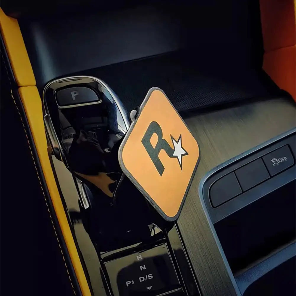 Car interior with a 'R' logo on a yellow background