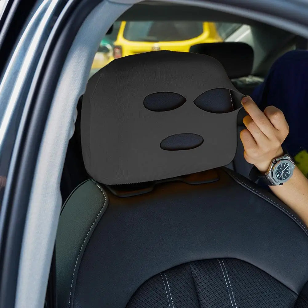 Person using a black Car Seat Headrest Ski Mask Halloween Decor Cover