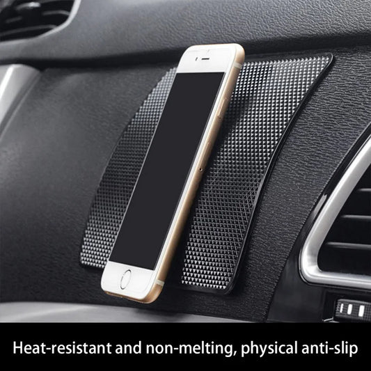 Phone holder on a car dashboard 'Heat-resistant and non-melting, physical anti-slip'.