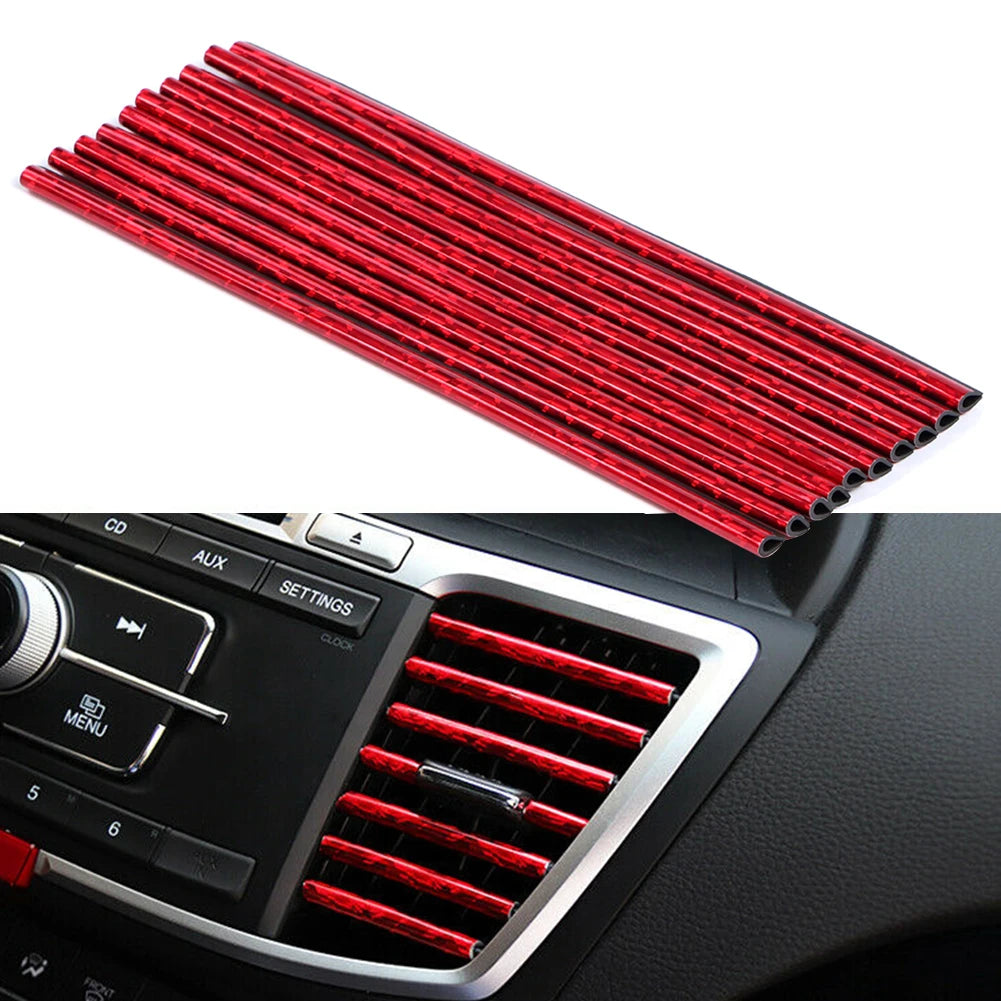 Red car air vent trim strips on a white background with a car interior view.