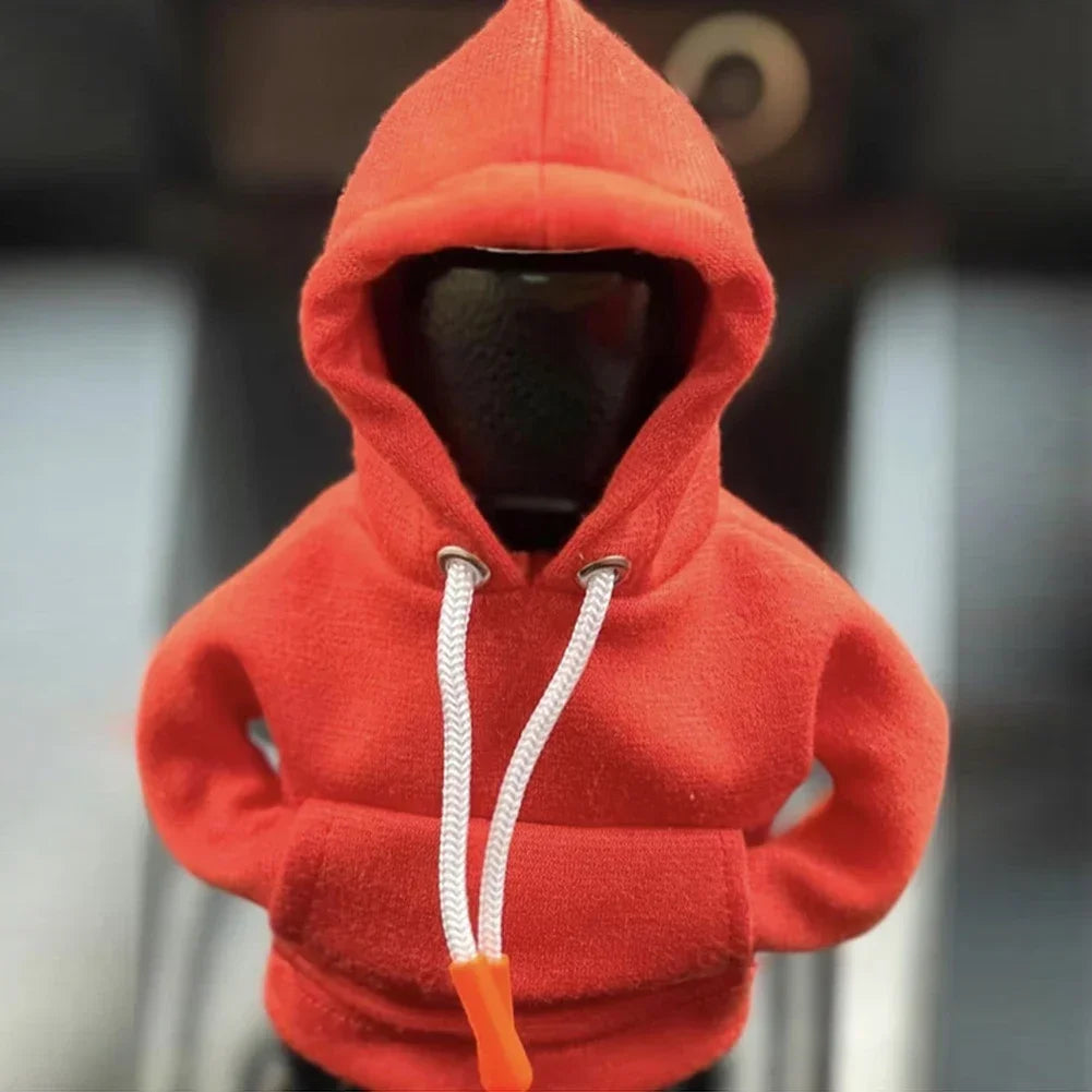 Red hoodie with a white drawstring on a blurred background
