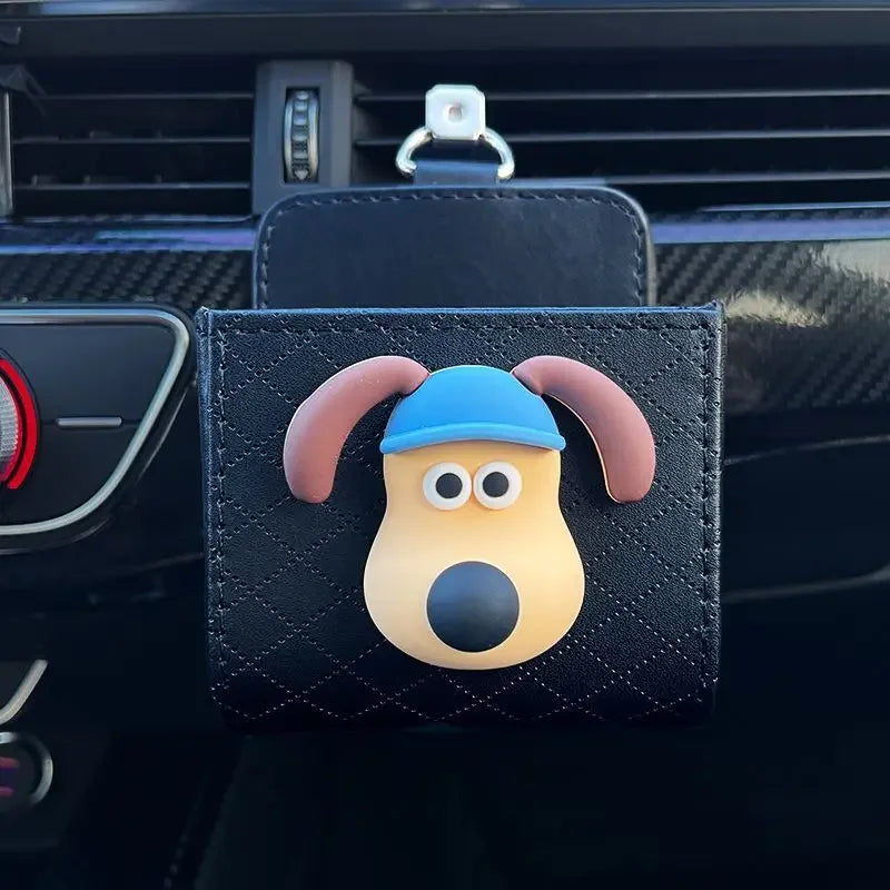 Car organizer a dog with a blue hat on a car dashboard.