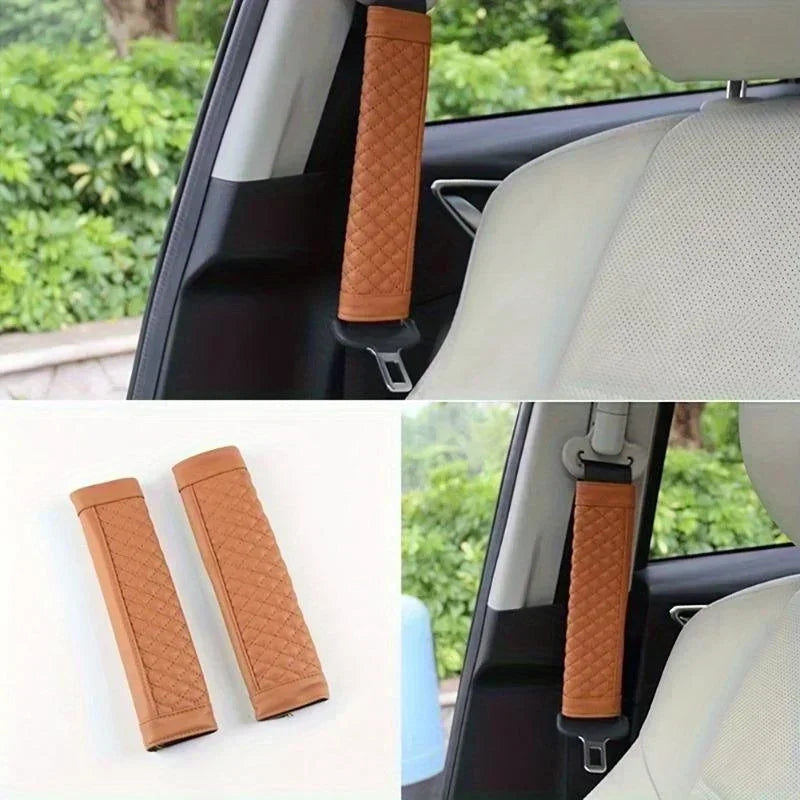 Car seat belt covers in brown leather texture on a car interior background.
