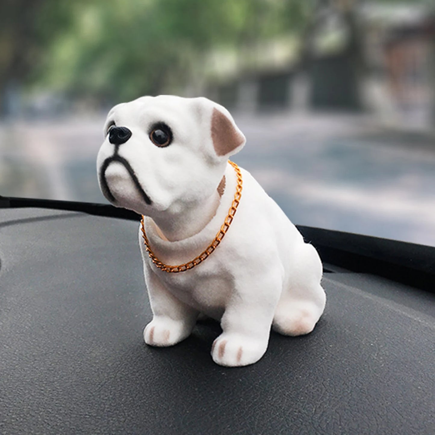Plush toy dog with a white body and gray patches 