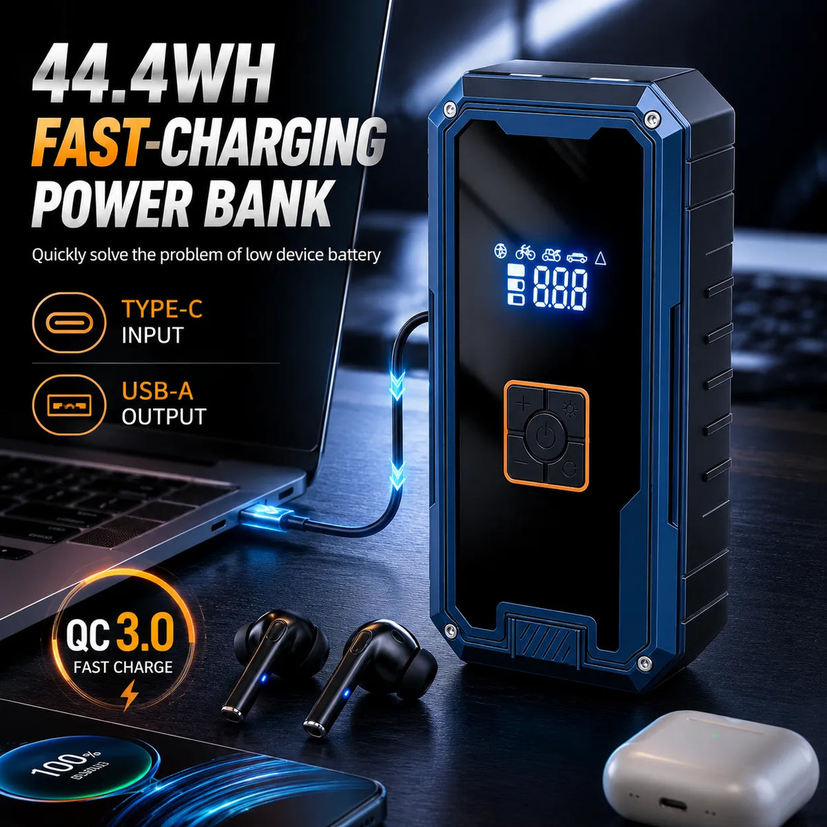 A rugged portable power bank with a black front panel and blue-gray side casing, shown plugged into a laptop on a desk with earbuds and a charging case nearby. Large text on the left reads '44.