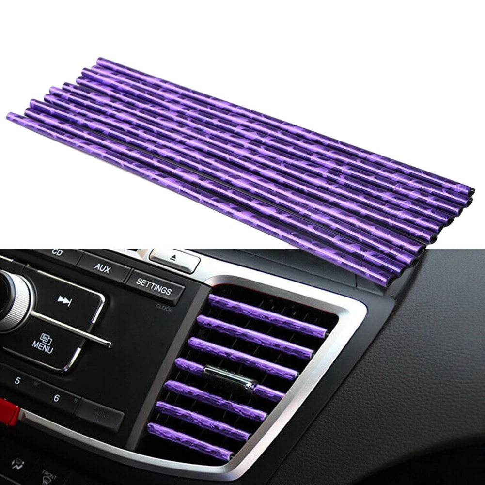 Purple car air vent trim on a car dashboard